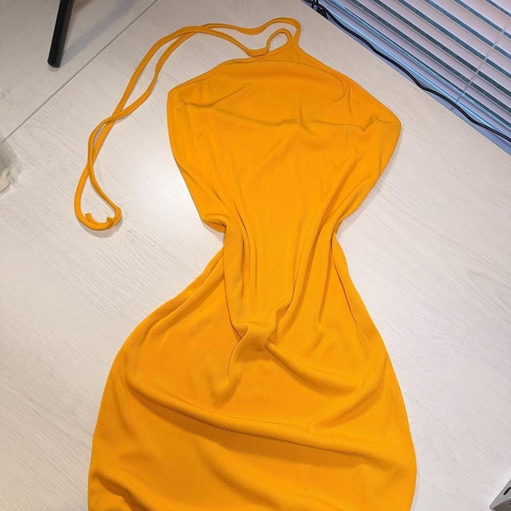 Yellow halter neck dress with fringe detail
